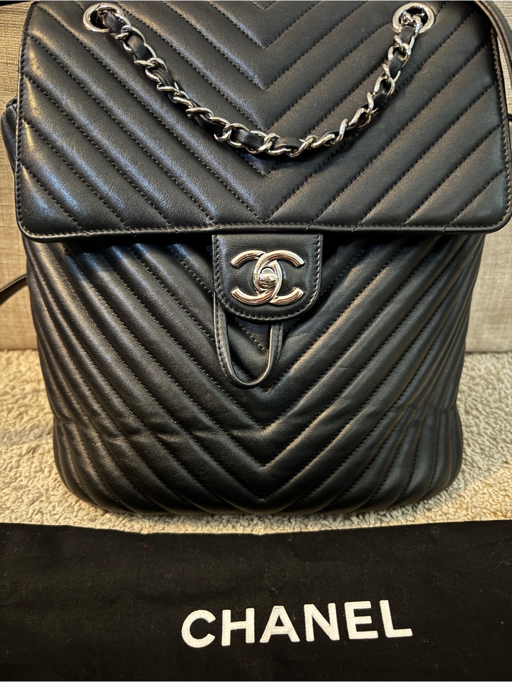 CHANEL Black Chevron Quilted Leather Backpack with Silver Chain